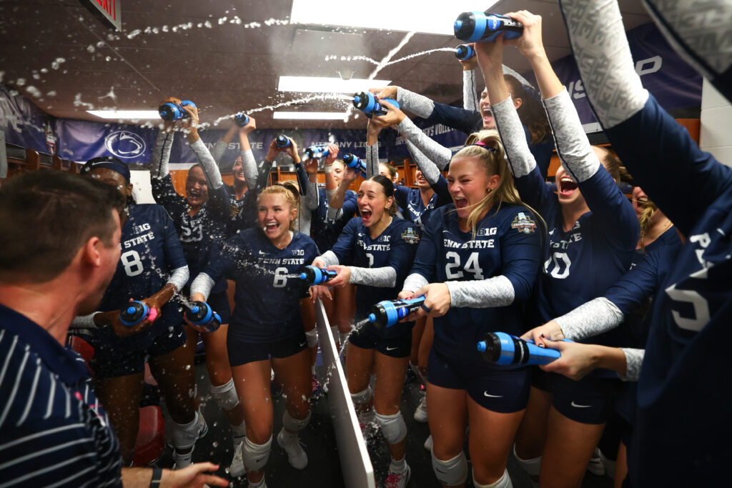 The Penn State volleyball team celebrated their upset victory over Nebraska in the NCAA semifinals in the locker room.