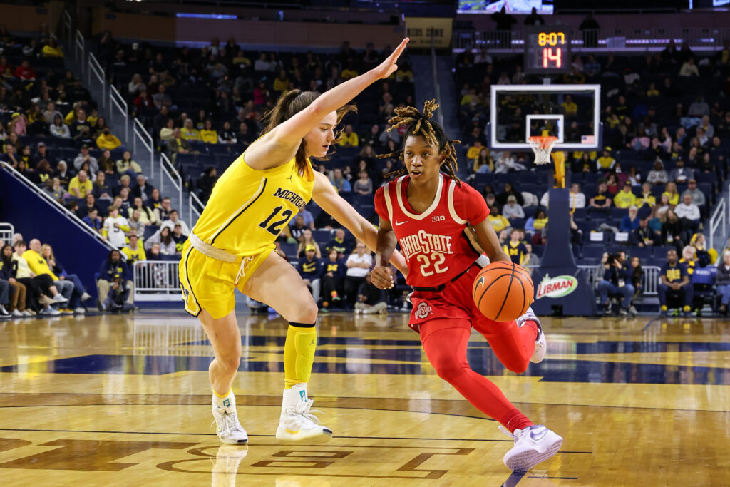 Michigan's Sierra Soz defends Ohio State guard Jaloni Cambridge's shot during Wednesday's game.